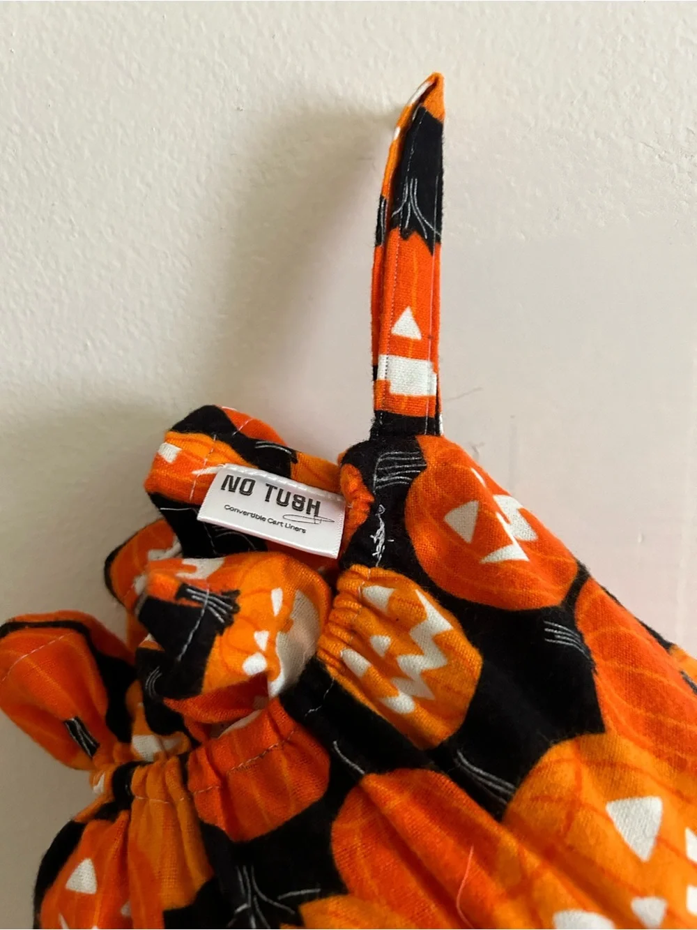Pumpkin glow in the dark costume shopping cart liner with matching handbag